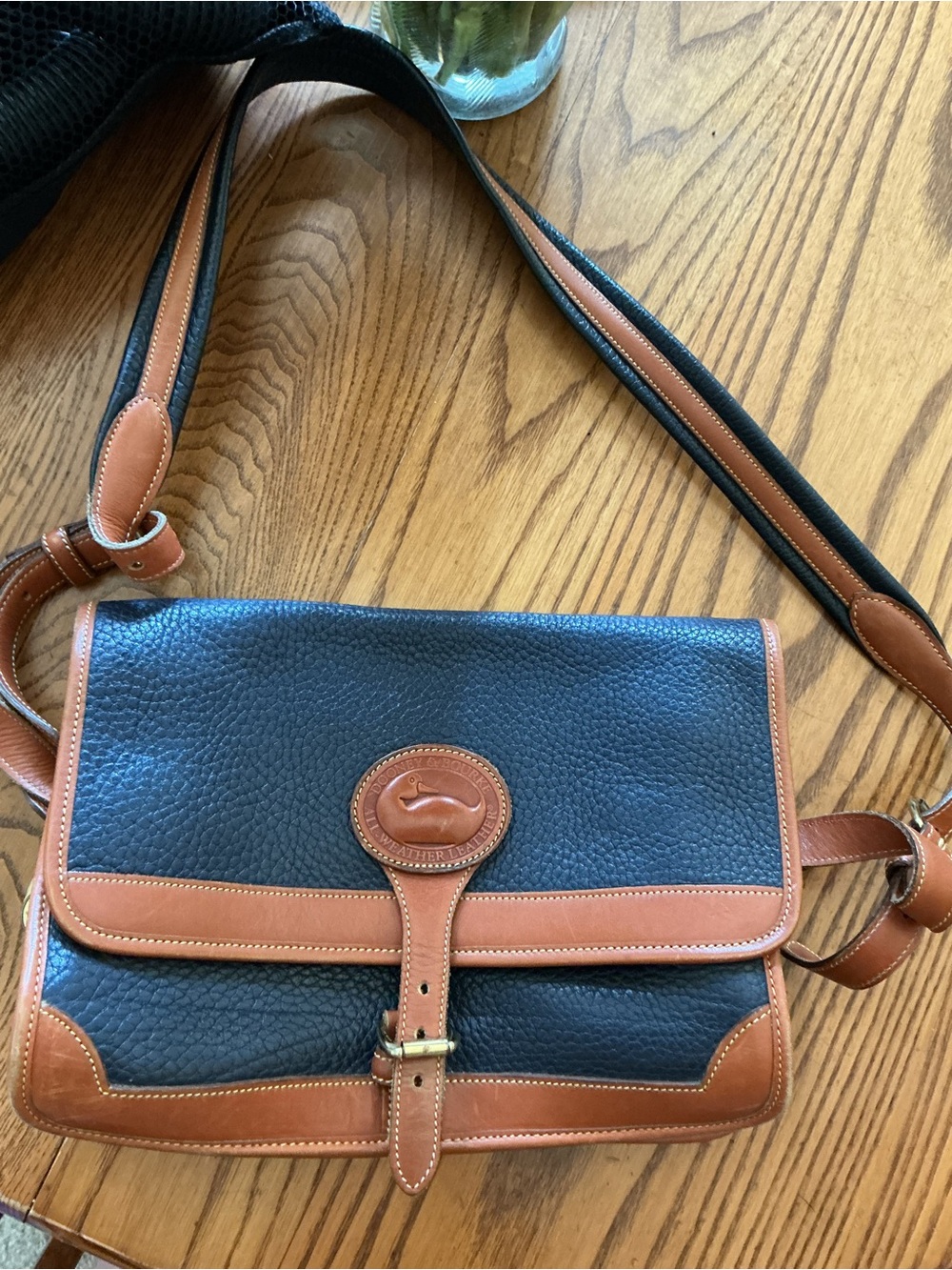 Dooney & Bourke Black Leather Messenger with Brown Trim